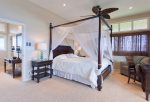 The master bedroom features canopy bed, sitting area with pull-out sofa, private lanai and jaw dropping ocean views
